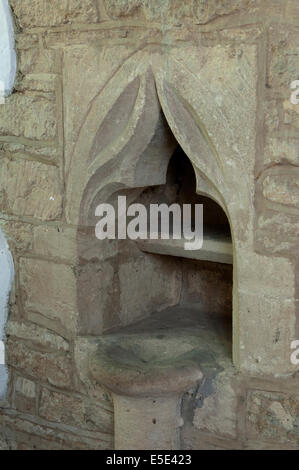 A piscina in St Mary`s Church, Lower Heyford, Oxfordshire, England, UK Stock Photo